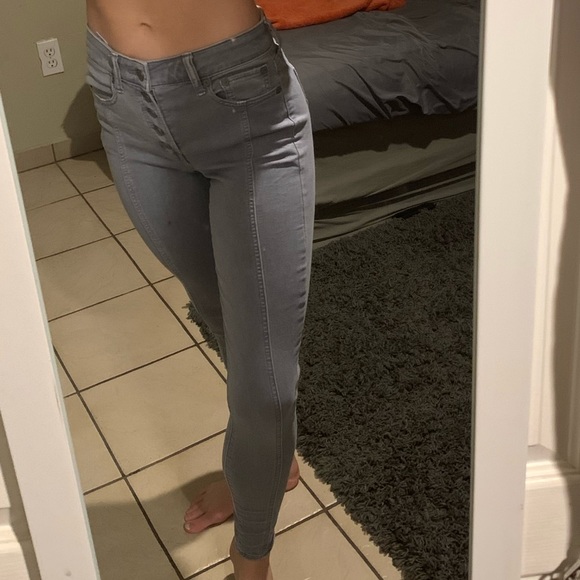 grey button fly jeans